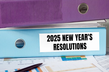 2025 New Year Business Resolutions Planning With Organizational Binders Documenting Goals and Strategies