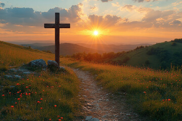 Sun setting behind a cross on hilltop.