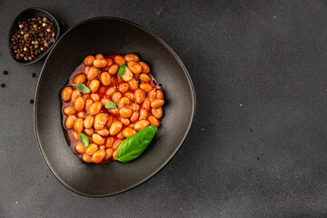 Bean stew tomato sauce cranberry beans vegetable dish beans borlotti fresh delicious gourmet food background on the table rustic food top view copy space keto and paleo diet vegan and vegan food