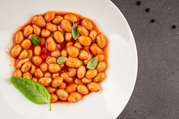 Bean stew tomato sauce cranberry beans vegetable dish beans borlotti fresh delicious gourmet food background on the table rustic food top view copy space keto and paleo diet vegan and vegan food