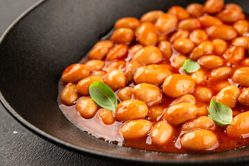 Bean stew tomato sauce cranberry beans vegetable dish beans borlotti fresh delicious gourmet food background on the table rustic food top view copy space keto and paleo diet vegan and vegan food