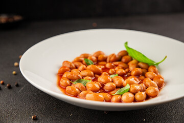 Bean stew tomato sauce cranberry beans vegetable dish beans borlotti fresh delicious gourmet food background on the table rustic food top view copy space keto and paleo diet vegan and vegan food