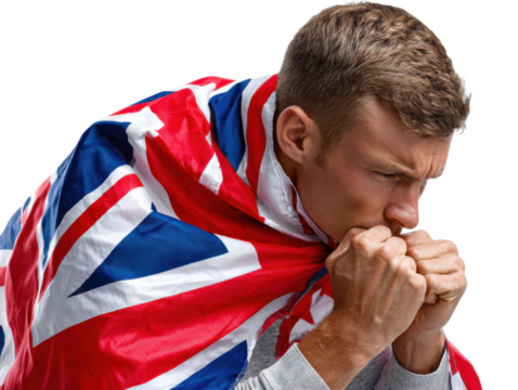 British Pride: A man shrouded in the flag, gazing downward, with a determined expression. A moment captured through an evocative portrayal of national fervor and identity.