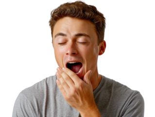 Sleepy Moment: A young man, his eyes closed, is caught mid-yawn, a picture of weariness and the need for rest, showing the body's natural signals of fatigue.