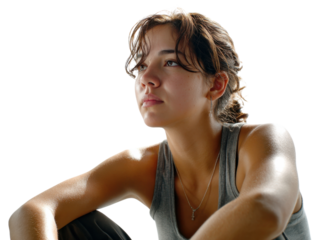 A Moment of Reflection: A young woman looks toward the future. She is contemplating in silence with a determined look. 