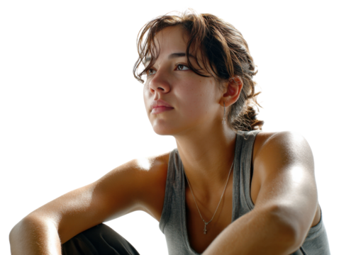 A Moment of Reflection: A young woman looks toward the future. She is contemplating in silence with a determined look. 