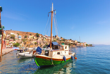 Fishing boat in harbor of Symi, Greece