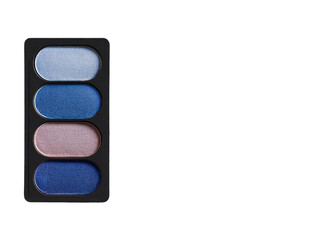 Close-up of a compact eyeshadow palette.  Four oval-shaped eyeshadows in varying shades of blue and mauve are arranged vertically in a black plastic case