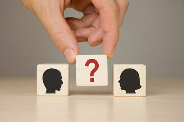 Wooden cubes with silhouettes of a male and female