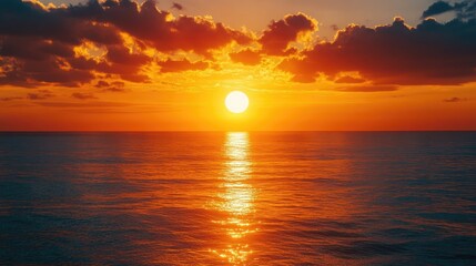 Large sun setting over the sea, casting golden light. --dcbbc5be-8491-4df6-82b3-fc34a816b813