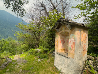 Traditional Christian holy house in the Maggia Valley, Switzerland.