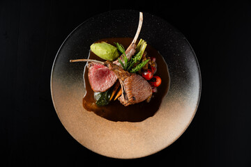 Gourmet Lamb Chops with Roasted Vegetables and Creamy Sauce