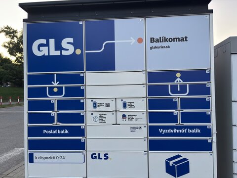 Bratislava, Slovakia, Europe - Jun 11, 2025: title: gls balikomat parcel locker with blue and white design, concept of package delivery, e-commerce logistics, automated pick up