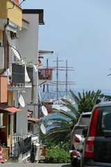 modern sailship through street