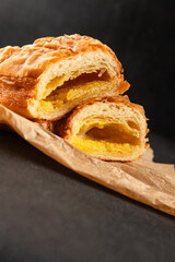 Triangle cake almond puff pastry sweet dessert fresh delicious gourmet food background on the table rustic food top view copy space