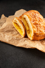 Triangle cake almond puff pastry sweet dessert fresh delicious gourmet food background on the table rustic food top view copy space
