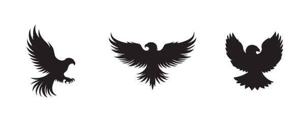 Set of three eagle or hawk silhouettes in mid-flight and landing poses, with wings spread and claws extended, isolated on a white background for nature or design themes
