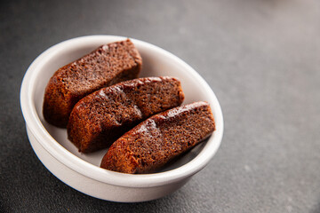 Biscuit Financier chocolate cookie sweet dessert fresh delicious gourmet food background on the table rustic food top view copy space