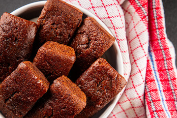 Biscuit Financier chocolate cookie sweet dessert fresh delicious gourmet food background on the table rustic food top view copy space