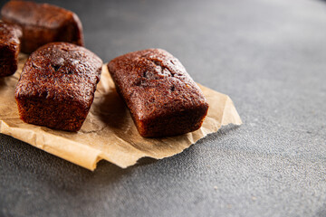 Biscuit Financier chocolate cookie sweet dessert fresh delicious gourmet food background on the table rustic food top view copy space