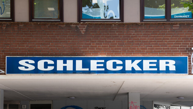 HAMBURG, GERMANY - 12. June 2025: Schlecker logo sign of the insolvent drug store chain on a building facade at the Reeperbahn. Advertisement signage of the bankrupt business of Anton Schlecker.
