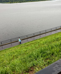 View from the top of the grassed slope down to the beautiful river embankment
