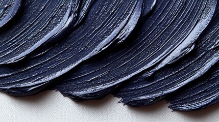 Close-up of textured dark blue paint strokes