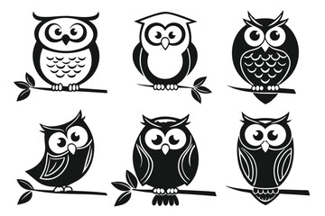 Fototapeta premium Set of six stylized black and white owl silhouettes perched on branches