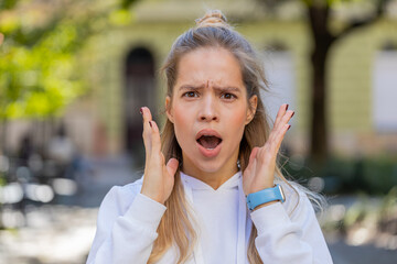 Shocked upset woman reacting to unpleasant awful idea, dissatisfied with bad quality shake head No,...