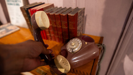Very old landline telephone with cord
