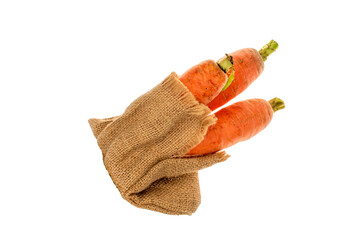 Organic carrots isolated on white background, macro.