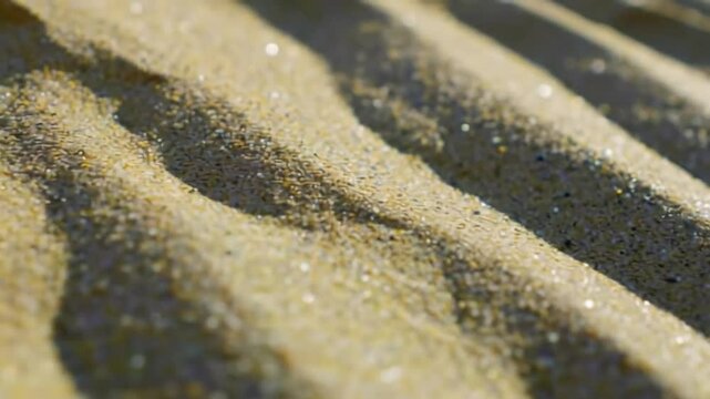 Close-up of textured light beige sand with parallel lines