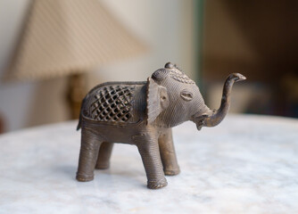 Handcrafted Dhokra Elephant Sculpture on Marble Surface