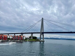 Stavanger bridge in Lysefjord with motor boat