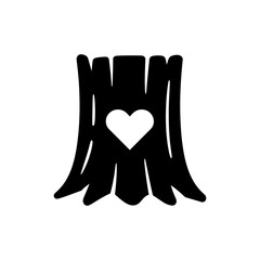 Tree Trunk with Carved Heart Symbol in Bark