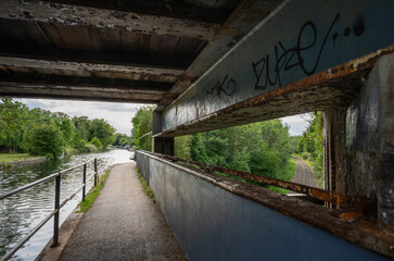 Southall, Greater London, UK: Windmill Bridge, more commonly known as Three Bridges is an engineering structure where a road crosses the Grand Union Canal which crosses a railway all at the same point