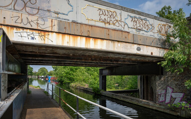 Southall, Greater London, UK: Windmill Bridge, more commonly known as Three Bridges is an engineering structure where a road crosses the Grand Union Canal which crosses a railway all at the same point