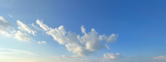  Sky view of white cloud. Sun shining through the soft puffy clouds. Beautiful sunny sky....
