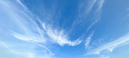  Sky view of white cloud. Sun shining through the soft puffy clouds. Beautiful sunny sky....