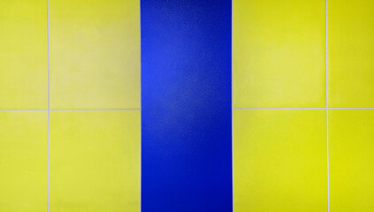 Yellow and blue wall background. Pastel painted wallpaper