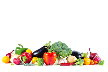 Fresh shiny multicolored vegetables isolated on white background.