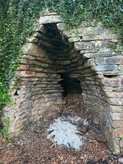 old stone kiln in the woods