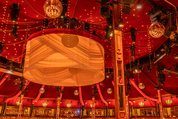 Empty stage of circus, variety or cabaret, scene stage with spotlights and stage machinery