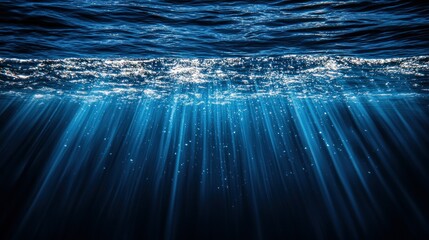 Underwater view of deep ocean, sunlight beams