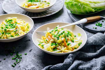 Chinese cabbage salad with carrots and green onions