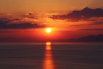 Obraz premium Fiery Sunset over Calm Ocean A Breathtaking View