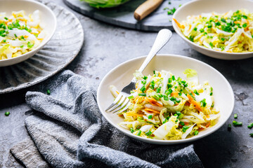 Chinese cabbage salad with carrots and green onions