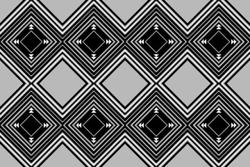 Ethnic patterns of black geometric diamond shape on grey background. Abstract motifs seamless vector. Concept of pixel arts, triangle, vintage for textiles, cloth texture, wrapping, batik, wallpaper.
