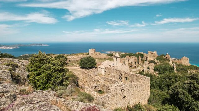 Time-lapse of visitors exploring the abandoned village of Occi near Lumio in the Balagne region of the Mediterranean island of Corsica