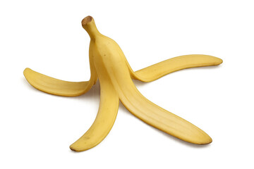 Discarded banana peel lying on clear surface, illustrating potential slipping hazard with comedic undertones of classic physical comedy